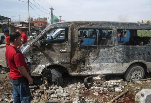 Irak: au moins 52 morts dans des attentats à la voiture piégée à Bagdad - ảnh 1